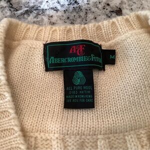 Mens sleeveless tennis sweater.